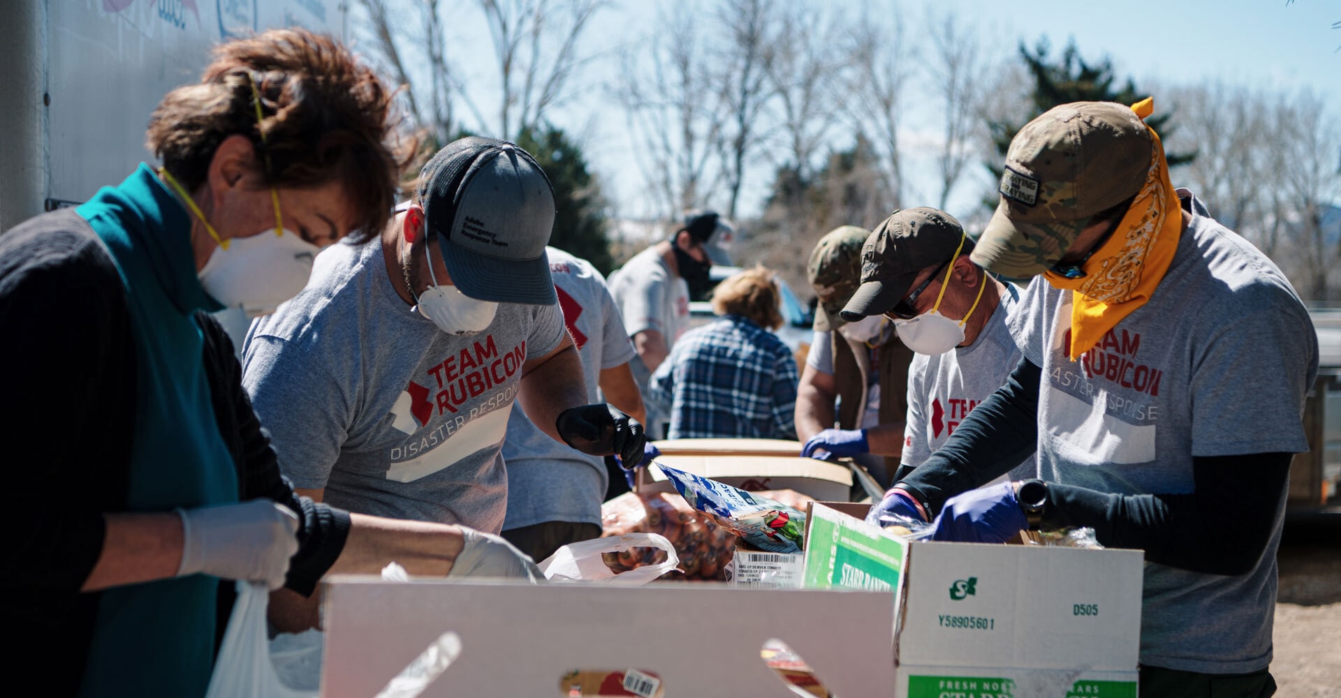 Team Rubicon staff helping with food distribution