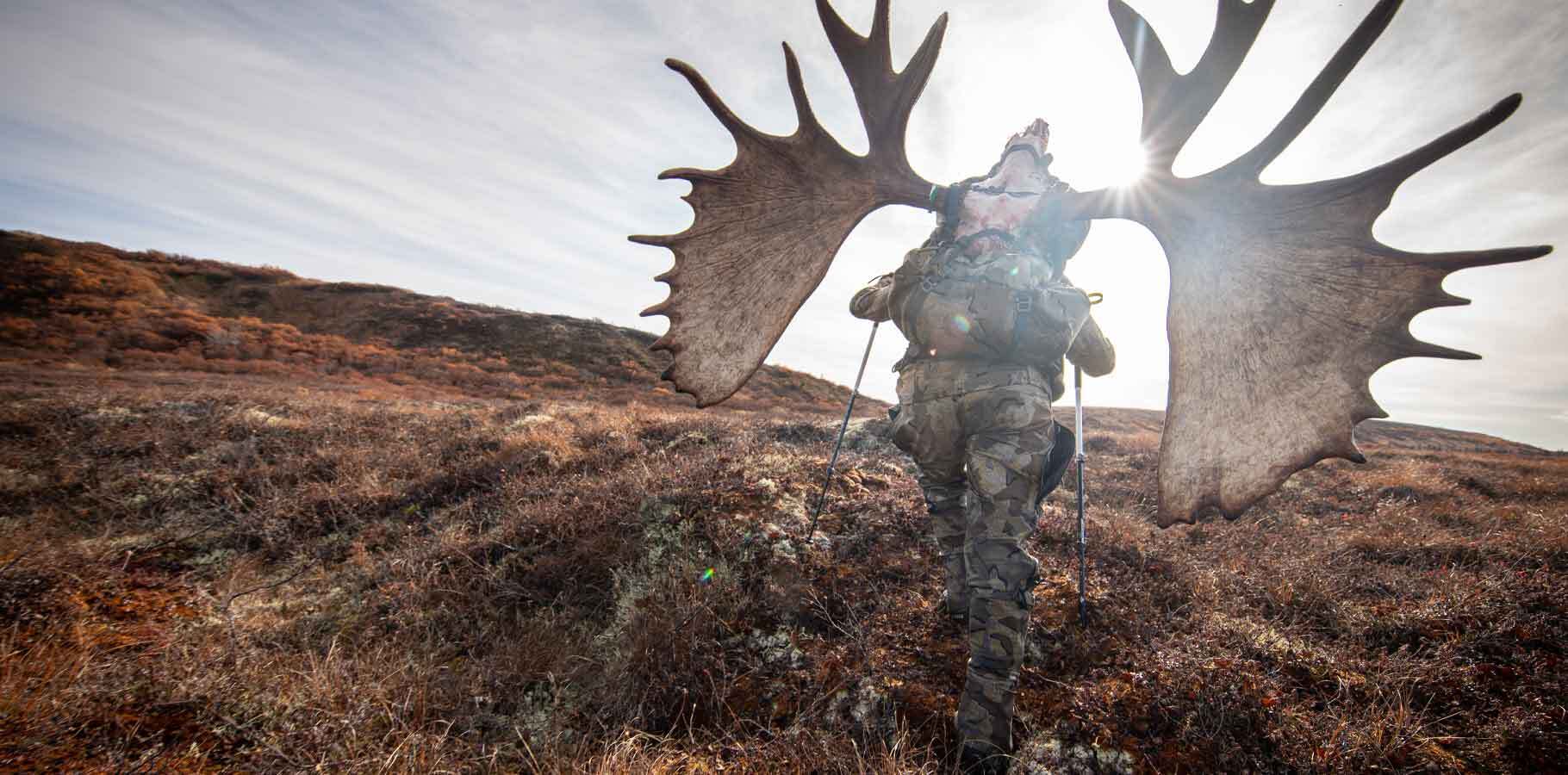 Back of Brendan Burns in Valo Camouflage With Giant Moose Skull on Pro Pack