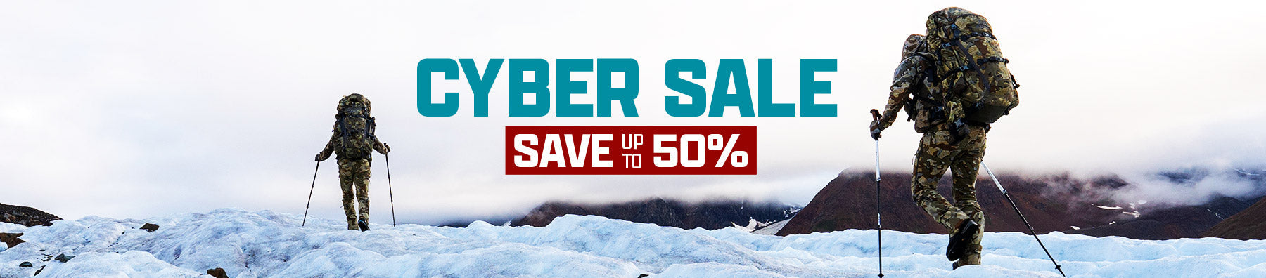 Two hunters trekking through the snow. Text reads: Cyber Sale – Save up to 50%