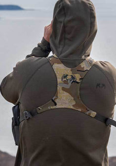 Back of Hunter Glassing Game Wearing Peloton 240 Full Zip Hoodie in Ash Brown Color