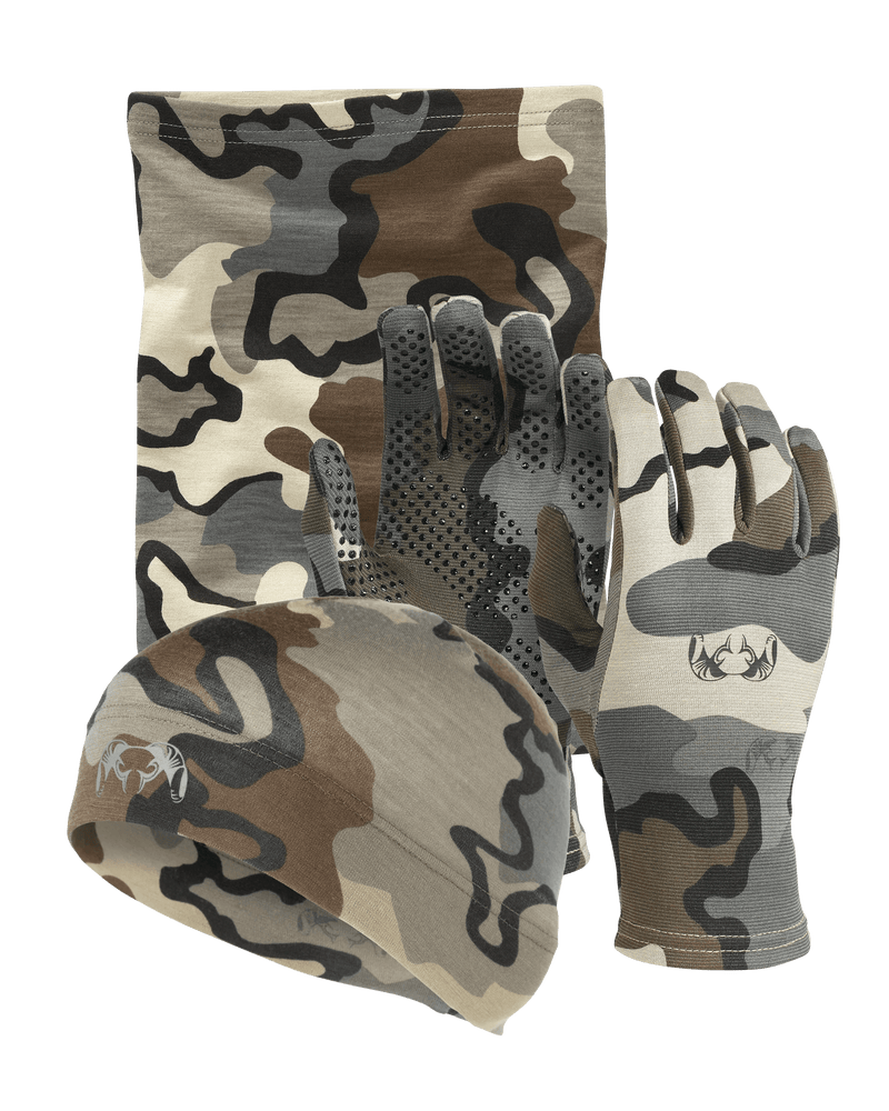 Image for the ULTRA Merino Stay Warm Set items in Vias Camouflage which in include an ULTRA Merino 145 Beanie, ULTRA Merino 145 Neck Gaiter, and ULTRA Merino 210 Gloves