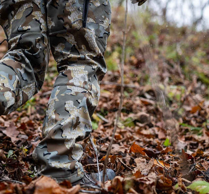 Rear, Detailed View of Axis Hybrid Pants in Valo Camouflage Highlighting Waterproof Membrane in Lower Legs